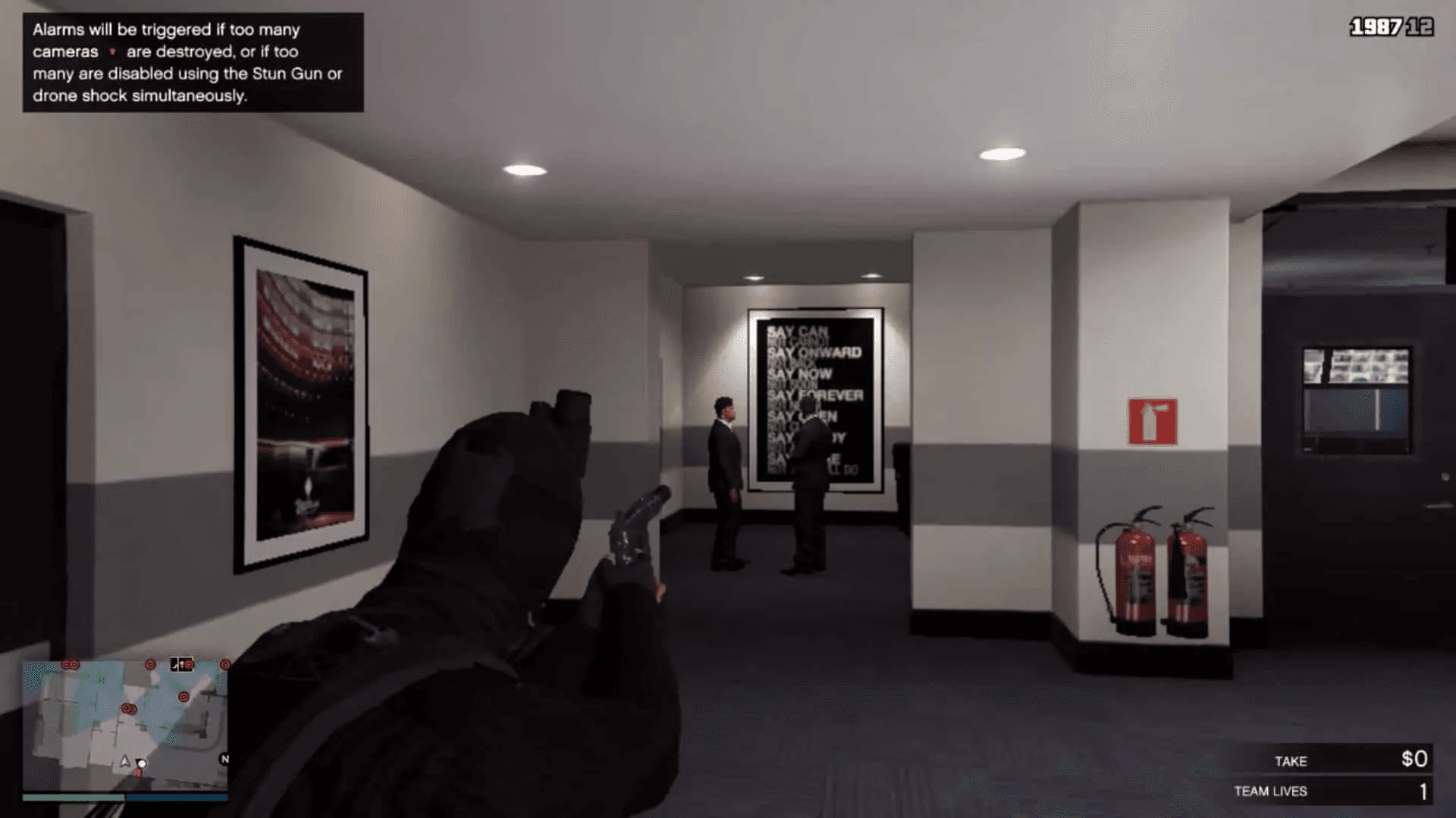 Two guards chatting to your right after taking out the camera