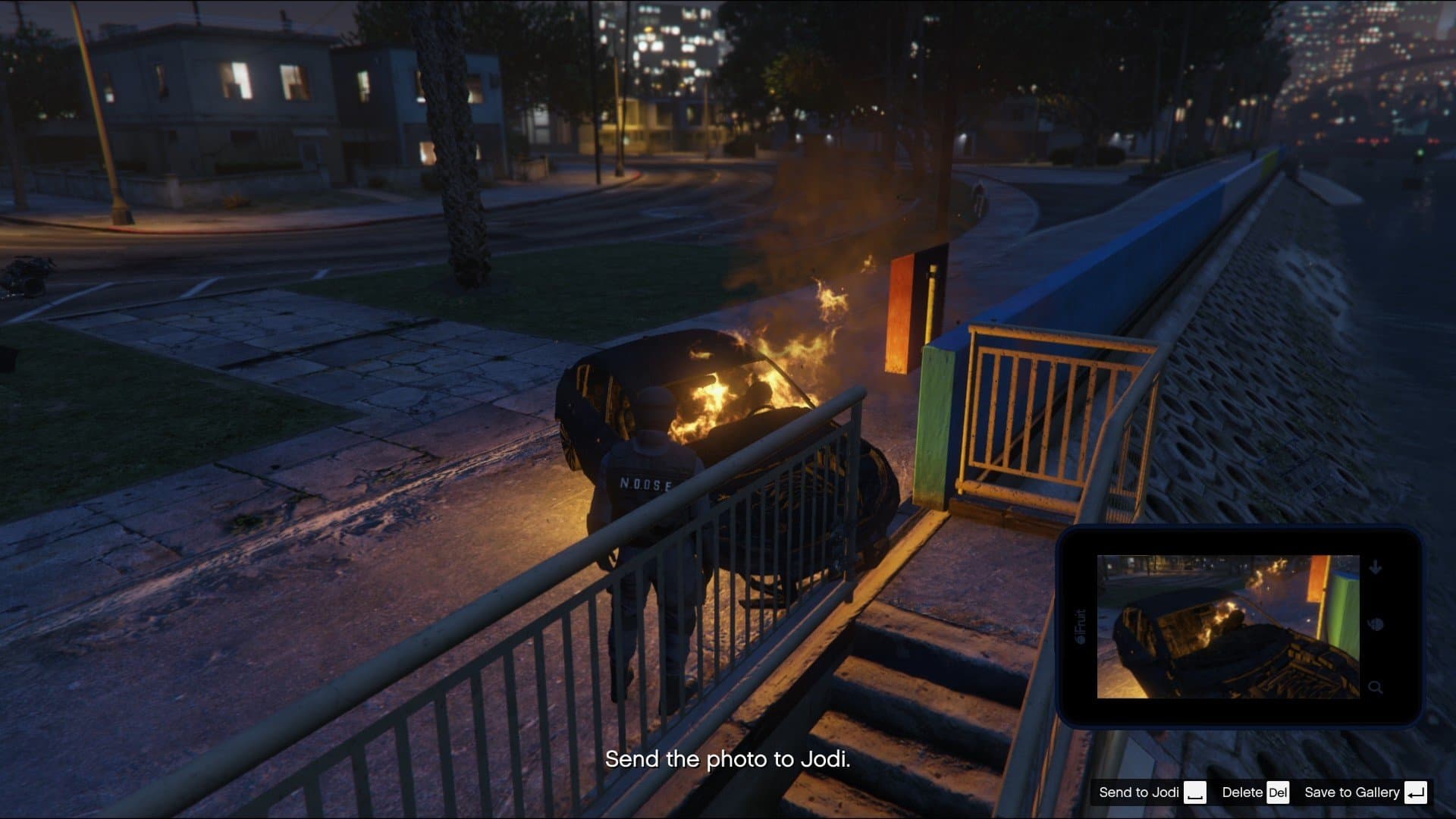 Sending the picture of the agent's dead body to Jodi for confirmation.