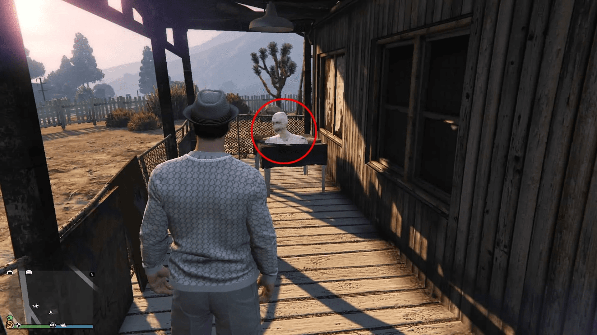 Mummy head on the table in the front porch