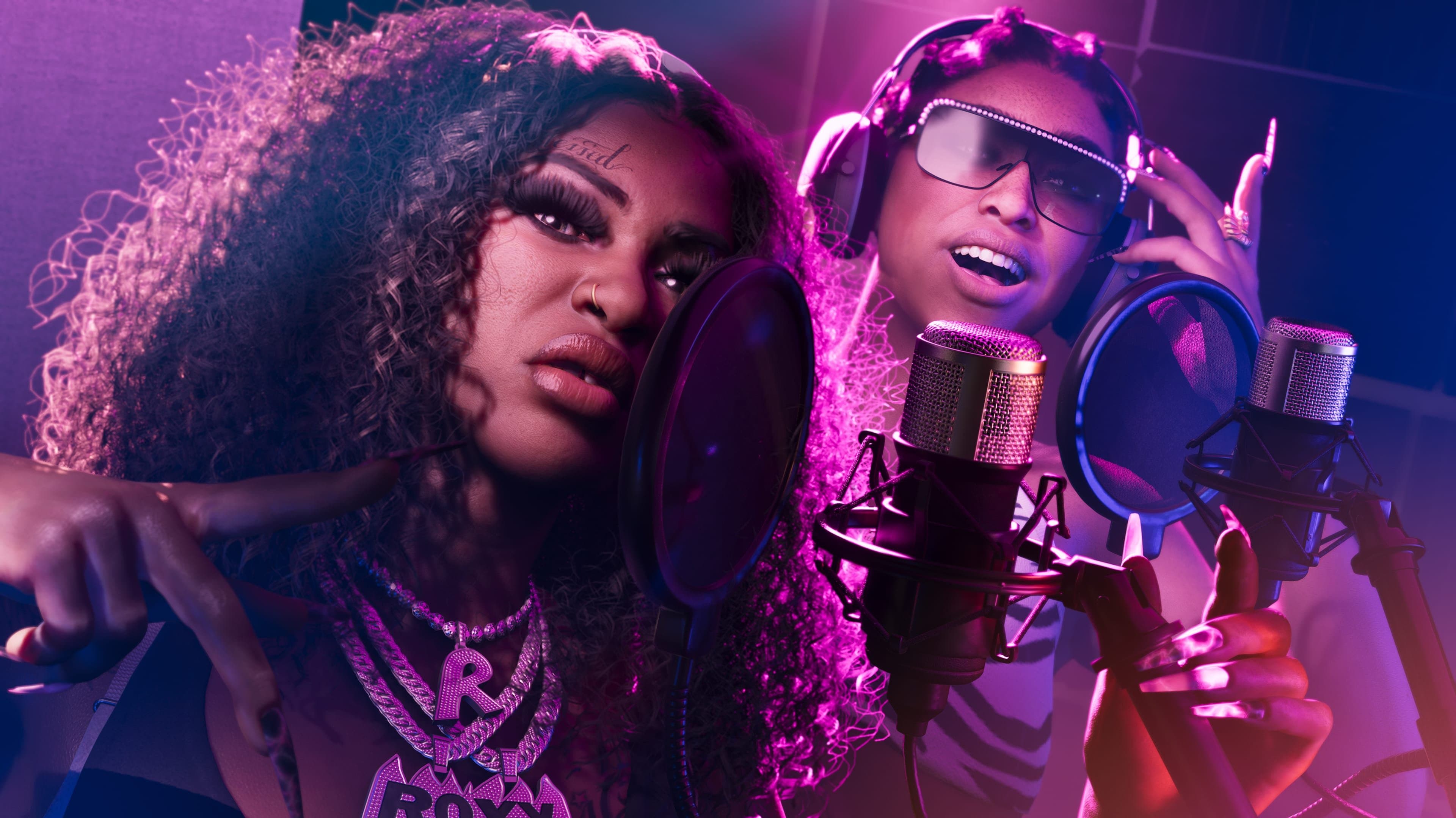 Bae Luxe and Roxy inside a recording studio.[