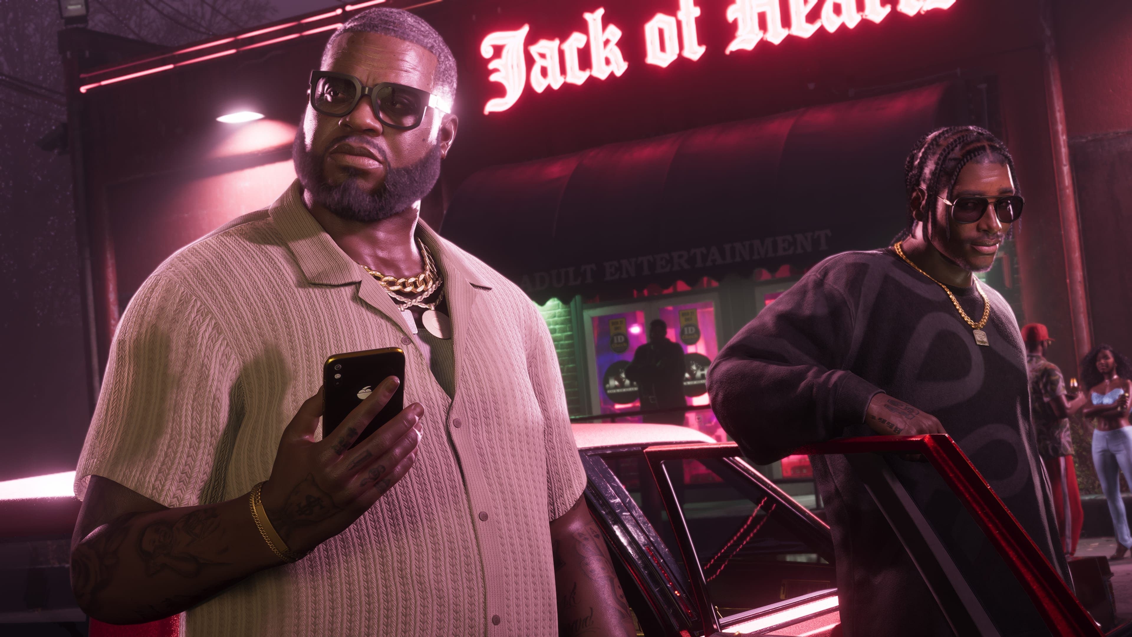 Boobie Ike with DreQuan Priest outside of the Jack of Hearts club.